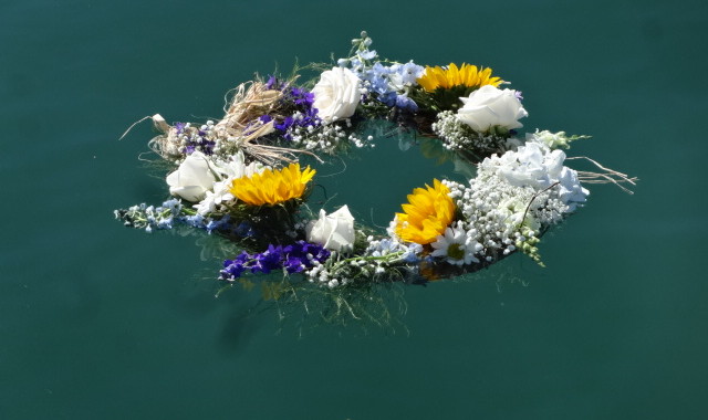 Wreath Floating in Ocean Memorial At Sea